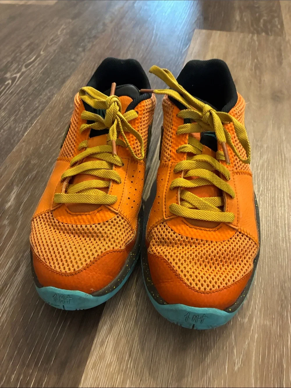 Nike Kids Orange and Yellow Mesh Athletic Sneakers with Teal Sole